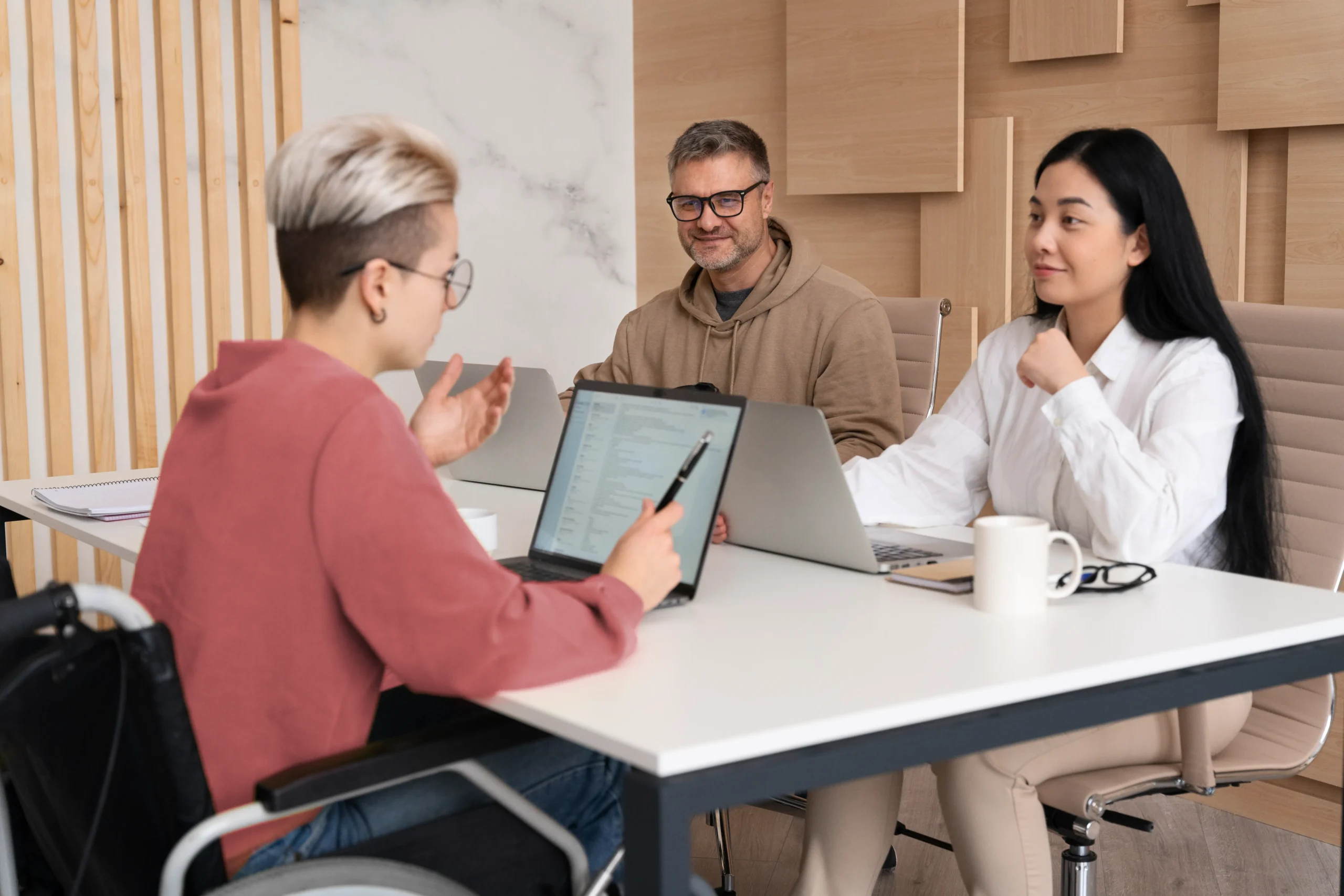 Father and daughter meeting with a college counselor